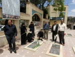 غبار روبی وگلباران قبور مطهر شهدا به مناسبت آزادسازی خرمشهر
